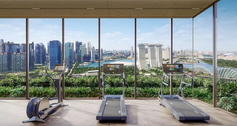 One Marina Gardens, artist&rsquo;s impression: a gym with full-height glass looking over Gardens by the Bay to Marina Bay Sands and the city